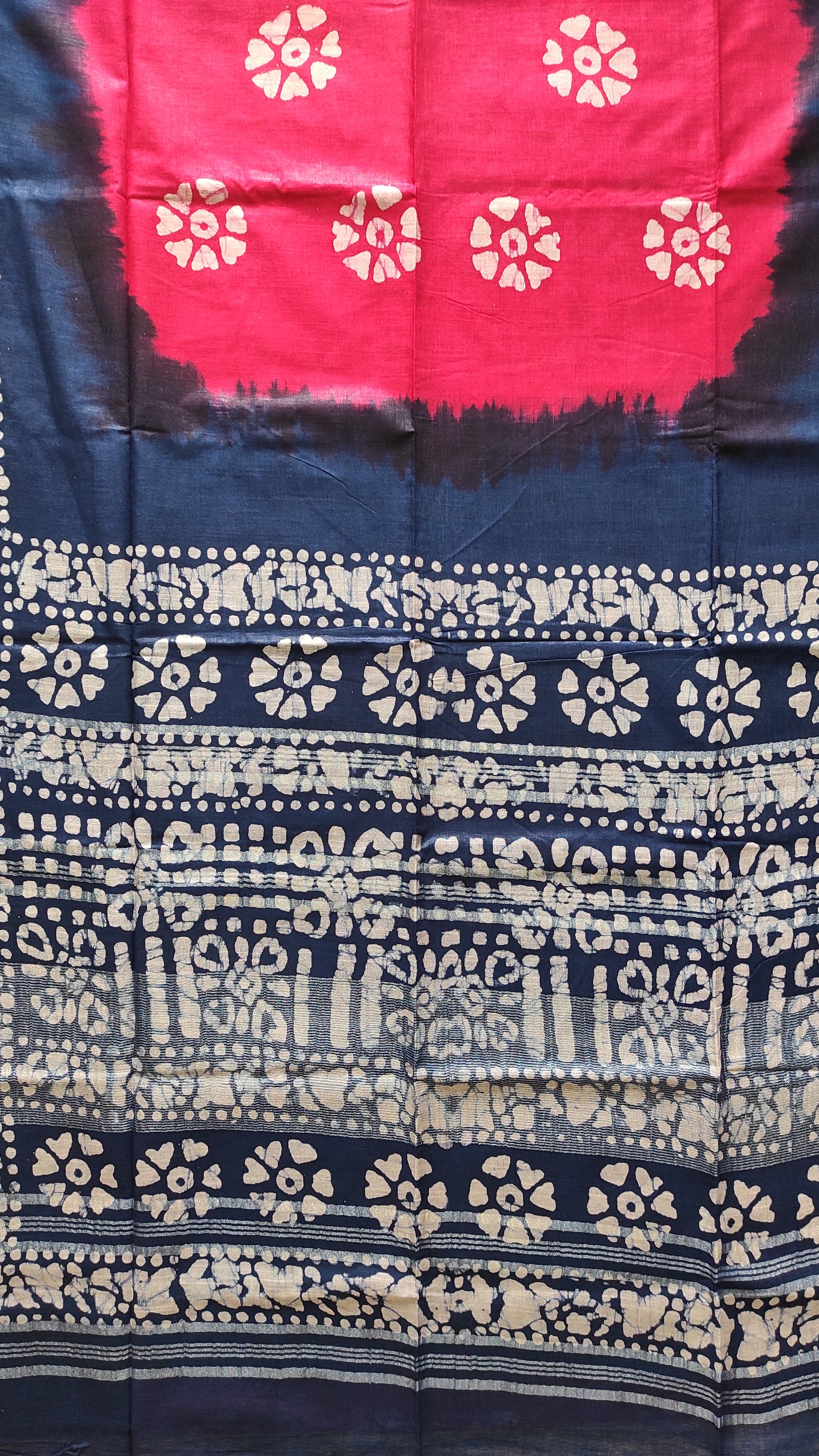 Saree with red, blue, and white patterns