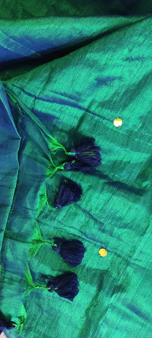 Peacock green handloom saree with shimmering copper effect and golden  work and dark green tassels listed to order saree online.