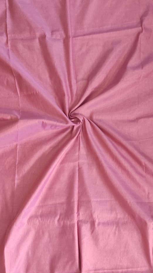 Tissue silk handloom saree draped on a saree stand which is pink in colour with copper shimmer and pink tassels